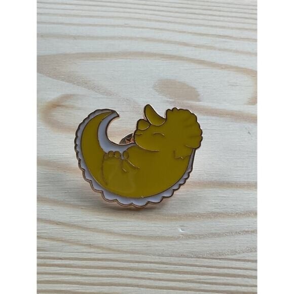Yellow Enameled Dinosaur Sleeping Triceratops - Picture 1 of 3